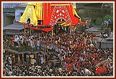 Devotees reverentially pull the Rath through the streets of Jagannath Puri