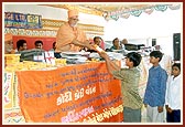 Distribution of study materials to village children