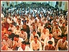Devotees seated in the convention hall
