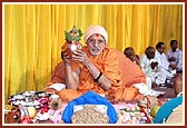 While Pujya Balmukund Swami presides over the mahapuja