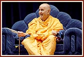 Swamishri laughs during one of the presentations