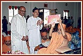 Swamishri launches the souvenir