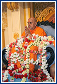 Swamishri was honored with garlands and decorated shawls