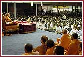 Saints and devotees engaged in Swamishris darshan
 