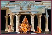 Swamishri seated in the morning session in front of a replica of the Yagnapurush Smruti Mandir 