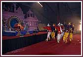 Kishores perform a dance in Swamishris presence