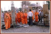 At the age of 80 years Swamishri walks through the uneven, rough surface to see and observe every part of the construction work and correct any aspect that was overlooked