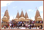 Devotees throng for Thakorji and Swamishri's darshan at the Shri Swaminarayan Mandir by the seashore in Tithal