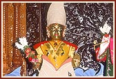 Shri Harikrishna Maharaj adorned with chandan as Matsya Avtar