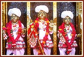 Shri Dham, Dhami and Mukta adorned in the traditional Kathiawadi style