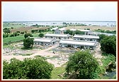 The new Gaushala of Mandir and Yagnapurush Sarovar in background