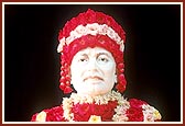 Shastriji Maharaj's murti decked with flowers on the day of Shraddh, Smruti Mandir