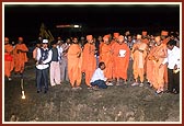 The day before the stone-laying ceremony, Swamishri observes the foundation pit
