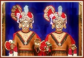   Shri Akshar Purushottam Maharaj adorned in chandan and beautiful designs