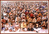 Singing a prayer during Swamishri's morning puja