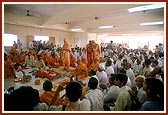 Devotees seated in the mandir hall during the pratishtha ceremony