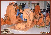 Swamishri offers prostrations to the newly consecrated murtis