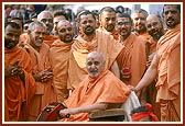 Swamishri in an attentive and jovial mood