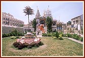 After darshan, Swamishri descends the steps of the old mandir