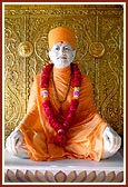 Swamishri engaged in darshan of and prayer before Shastriji Maharaj at Smruti Mandir