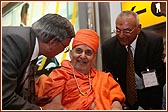 Swamishri with devotees 