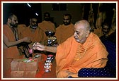 Swamishri performs the foundation-stone laying rituals on the bricks for BAPS Swaminarayan Mandir for Godhra