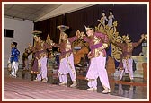 Children students of BAPS Swaminarayan Vidyamandir, Atladra, perform a traditional dance 