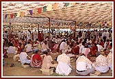 Couples participate in the yagna for world peace