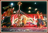 A traditional folk dance during a stage program