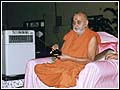 Swamishri operating the remote control car