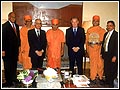 The President and Mr. Carlos Marques with Swamishri, Thakorji and the accompanying group of sadhus and devotees