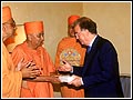 H.E. George Sampaiao, President of Portugal, greets Pramukh Swami Maharaj at the presidential palace - Palacio De Belem, in Lisboa, Portugal
