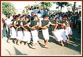 Tribal children perform a folk dance 
