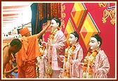 Swamishri worships and prays to the deities during the yagna 