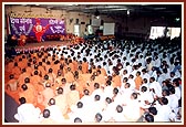 Devotees seated in the shibir listening to Swamishri's blessings