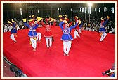 Youths perform a traditional dance