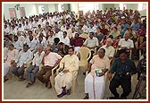 Scholars seated in the seminar