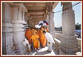 Swamishri observes the gaumukh in the mandir pradakshina