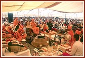 Swamishri engaged in yagna rituals