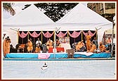 Swamishri and senior sadhus on the Jal Jhilani festival stage.