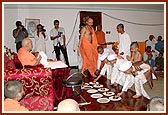 Kampala Bal Mandal offering gifts to Swamishri during his morning breakfast