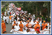 hus and devoteees during the grand Bhakti Yatra procession