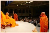 Ghanshyamcharan Swami and Krishnapriya Swami make Swamishri and the audience laugh