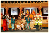 A drama performed by the children demonstrates the need for a true guru