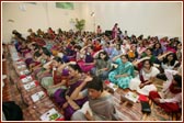 Devotees participating in the mahapuja vidhi