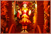 Ghanshyam Maharaj is beautifully adorned with flowers