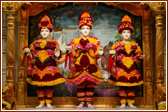 The images of Dham, Dhami and Mukta adorned with flowers