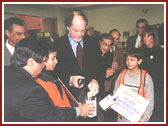 Jon Corzine donating to kids 