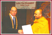Tilakratna Swami accepting the Proclamation from the Governor 