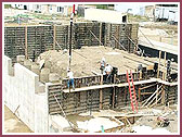 Pouring of all foundation walls and a grand stair 